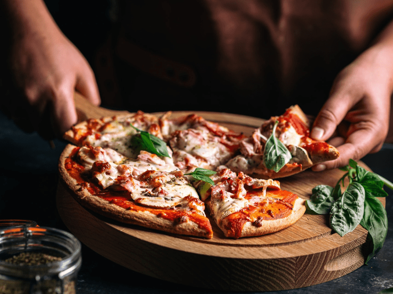 Photo of a pizza being use for tiplo