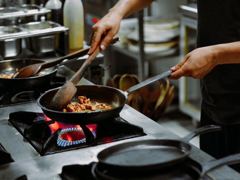 Restaurant manager reviewing tip payout records at the end of a shift